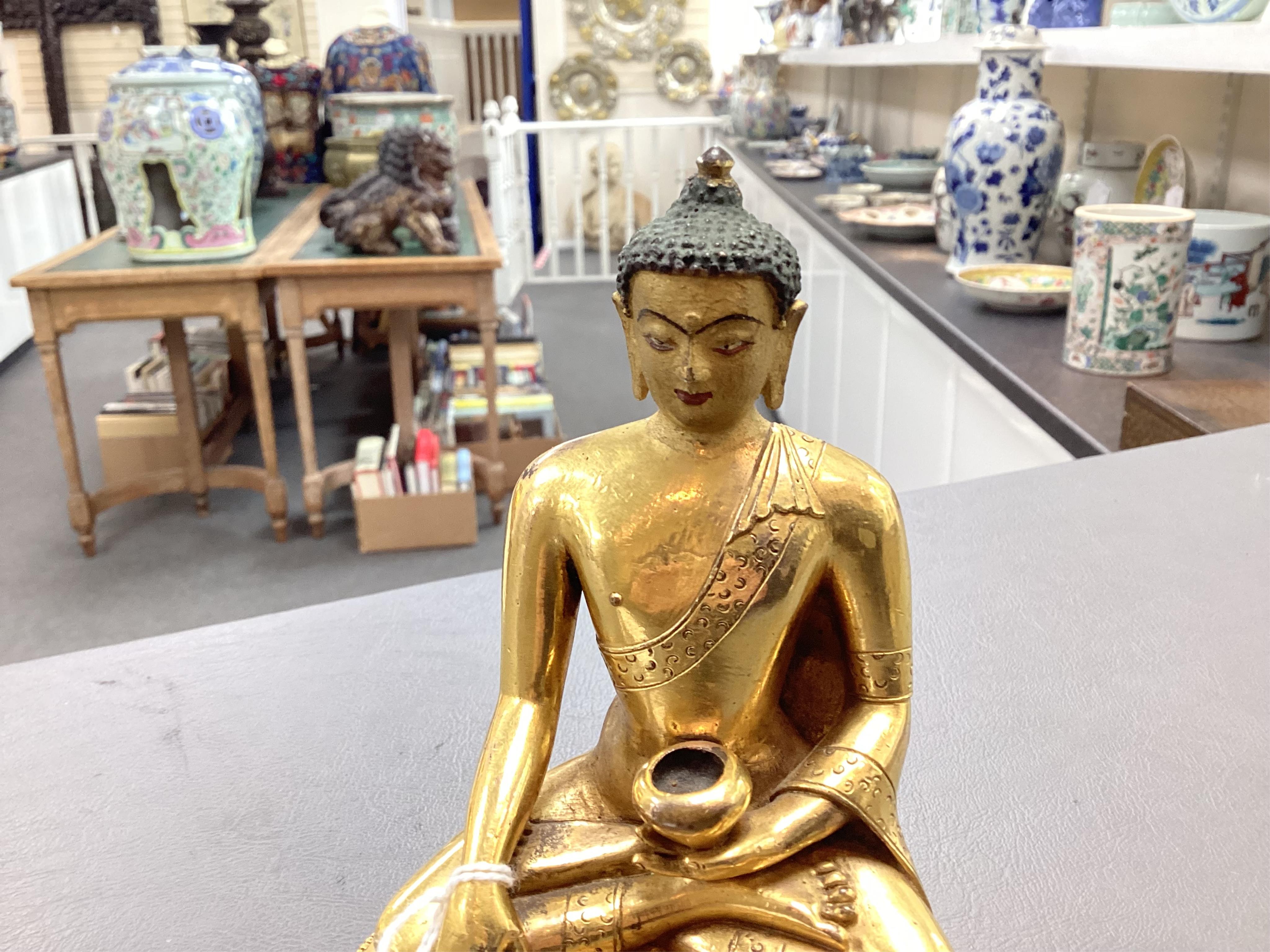 A Mongolian gilt-bronze figure of Buddha Shakyamuni, possibly 18th century